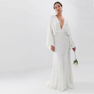 ASOS DESIGN Lennox sequin blouson sleeve wedding dress with train in ivory.